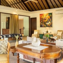 Asraya villa luxurious interior with seating traditional furniture and in room massage bed space sanur 870x500