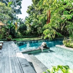 Asraya villa stunning private villa pool area with wooden deck sun loungers and lush tropical foliage sanur 870x500