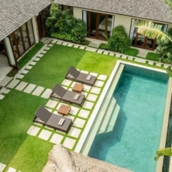 The suar aerial view luxurious villa pool lawn lush greenery seminyak 870x500