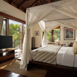 The suar luxurious master bedroom four poster bed garden views seminyak 870x500