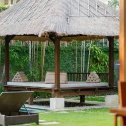 The suar traditional thatched gazebo daybeds lush garden seminyak 870x500