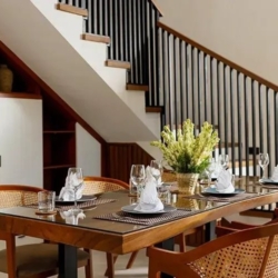 Villa ananya elegant dining room wooden table woven back chairs seminyak 870x500